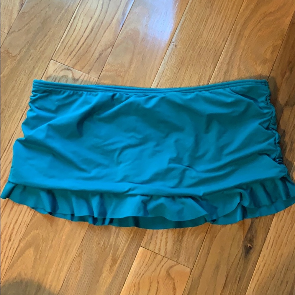 Tommy Bahama teal bathing suit skirt. fits size 4